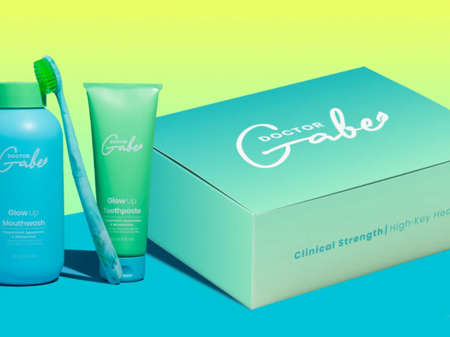 Doctor Gabe packaging: mouthwash, toothpaste and a brush beside a printed mailer box.